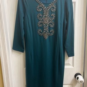 Teal dress with metal design